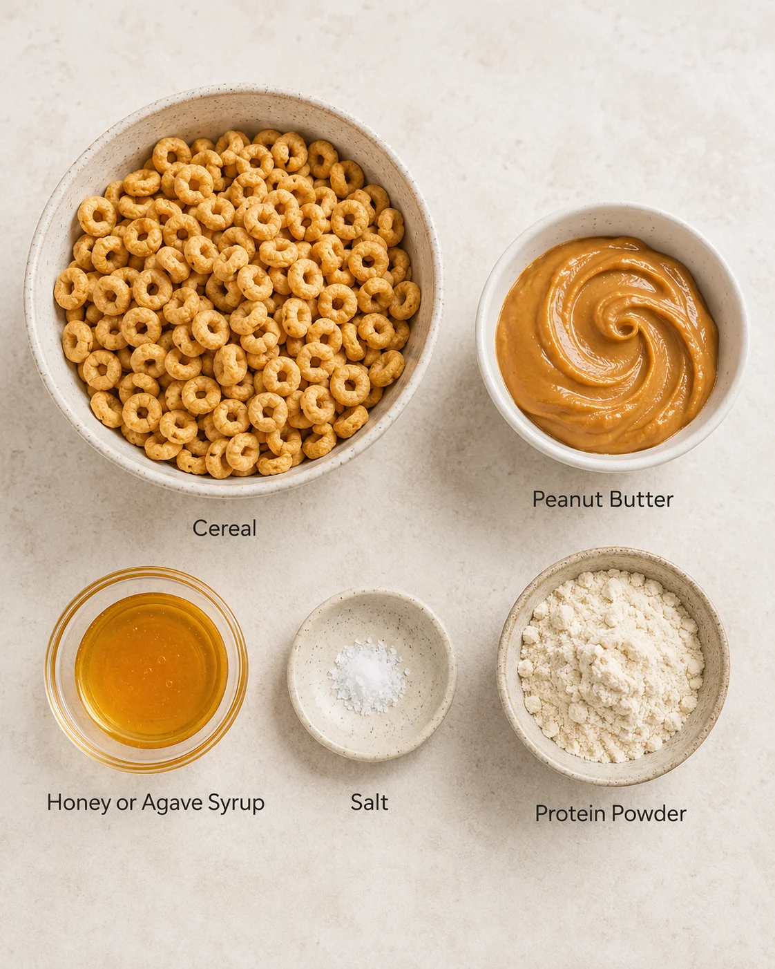 Gathered ingredients for quick cereal bars including cereal, peanut butter, and syrup.